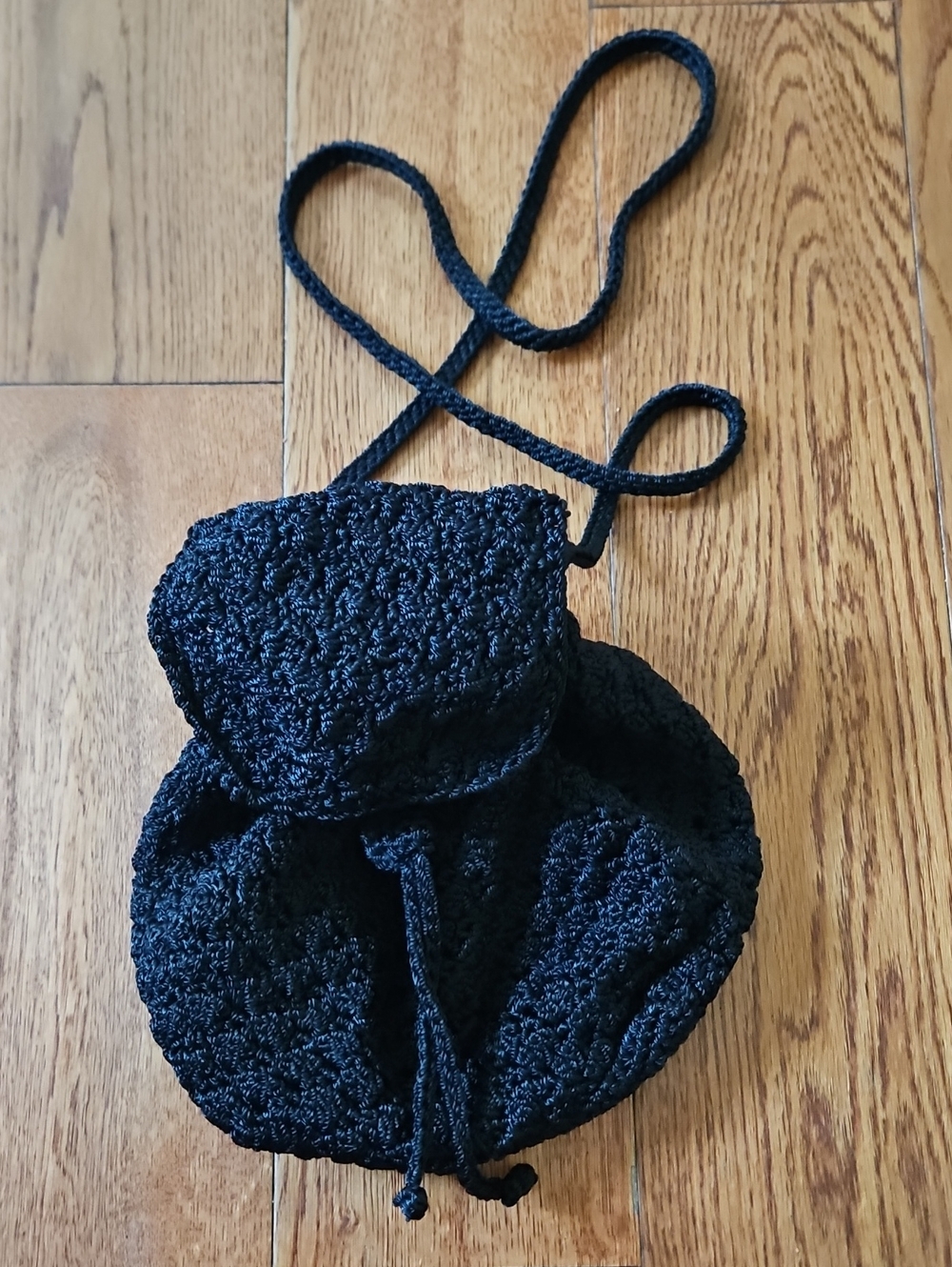 The SAK Black Crochet Drawstring Crossbody Bag